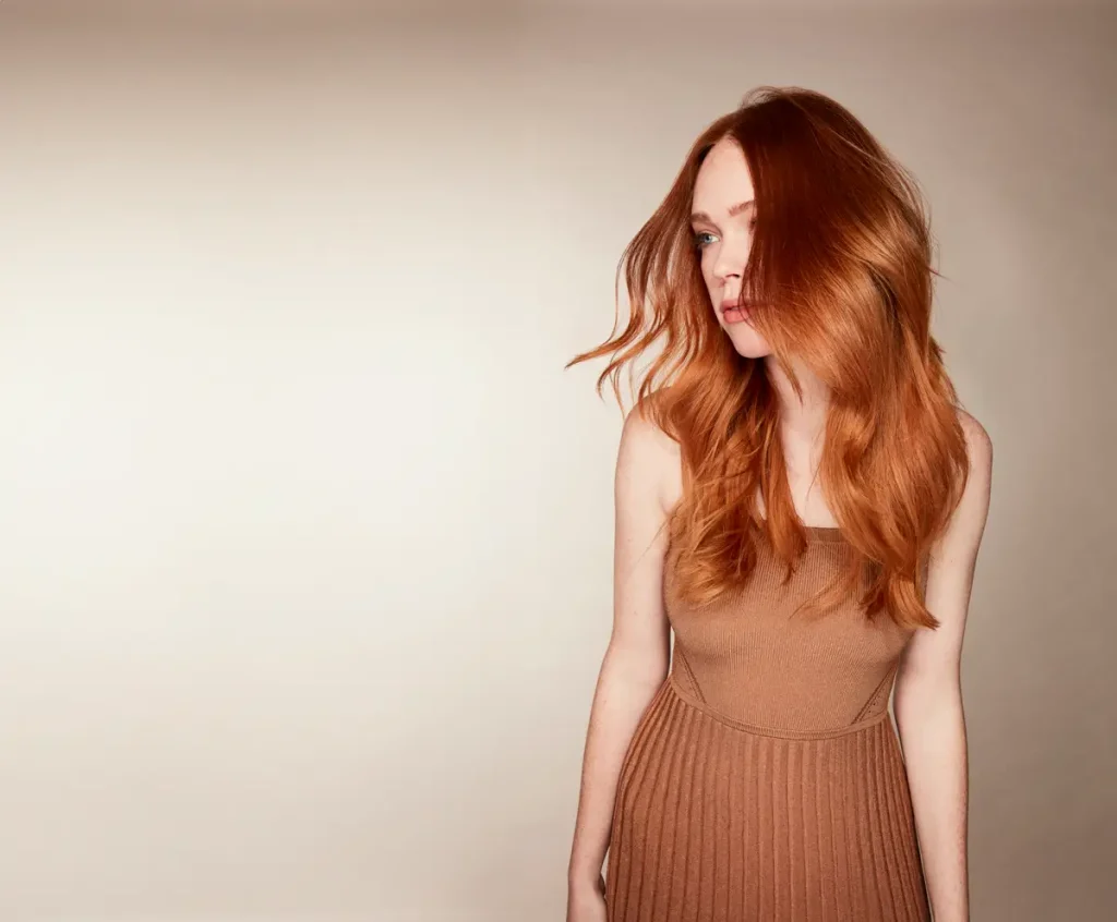 Model with long copper hair